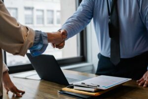 A discreet negotiation in an off-market property deal.
