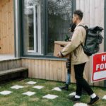 A couple moving into a house for rent.
