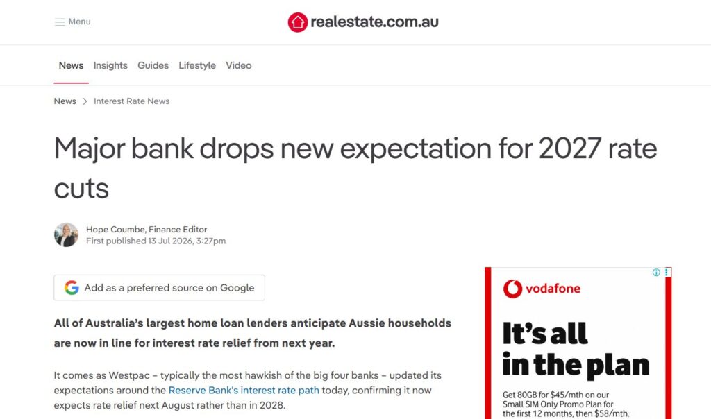 Screenshot of a realestate.com.au news article titled Major bank drops new expectation for 2027 rate cuts with a brief summary and site navigation at the top.