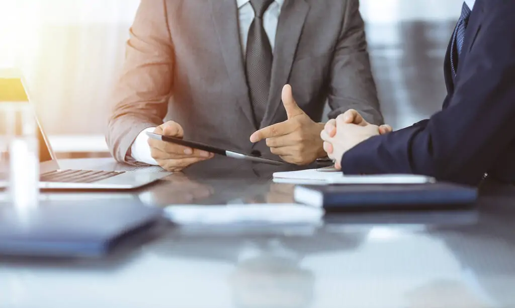 A first-time property investor consulting an expert